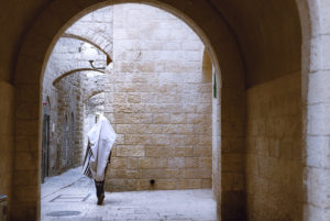 A Jew on his way to pray in the Jewish Quarter of Jerusalem